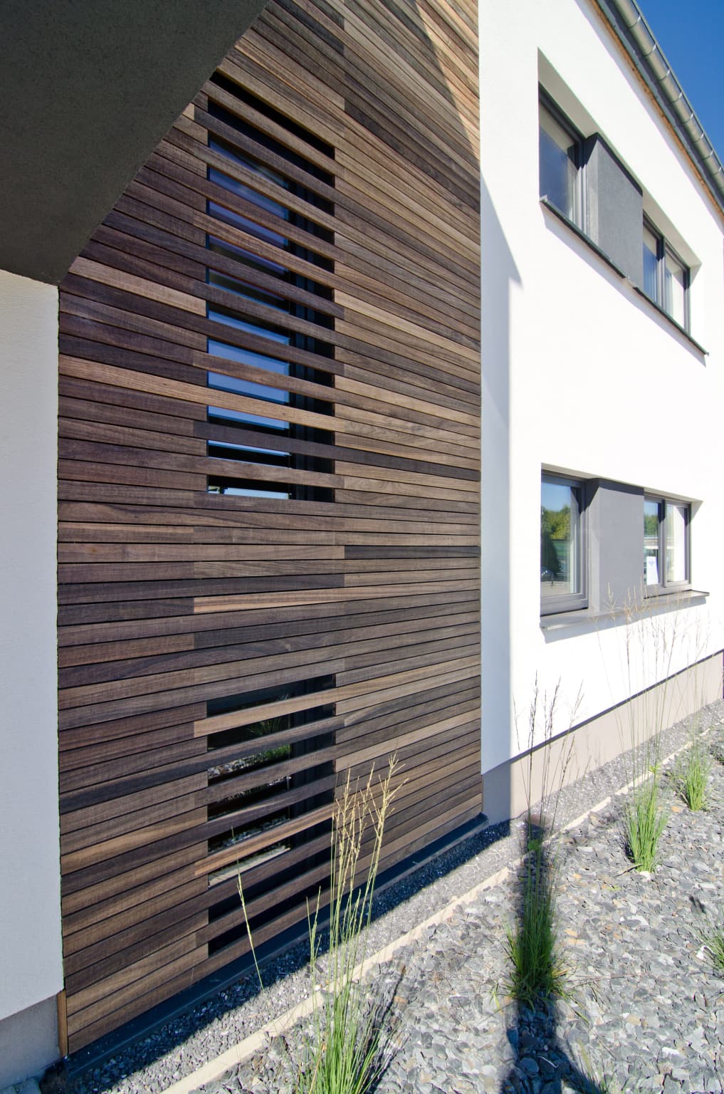 An ultra-design facade window with the Techniclic Padouk wood cladding ...