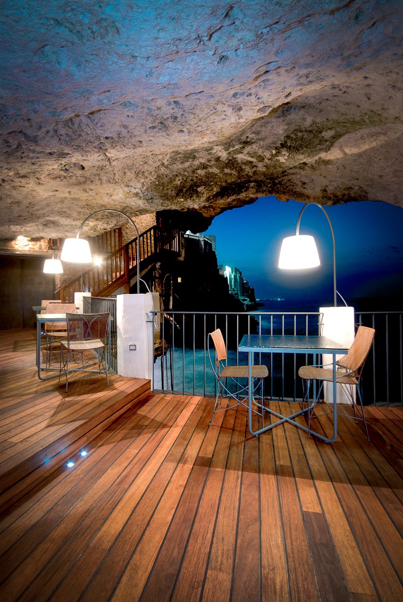 Incredible Restaurant Hostel Grotta Palazzese in Bari Italy next to the see luxury romatic restaurant with softline merbau shipdeck joint