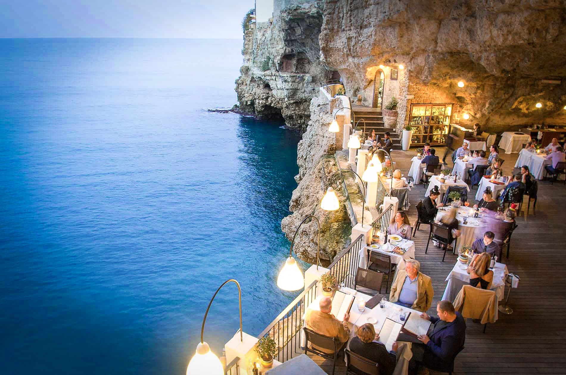 Incredible Restaurant Hostel Grotta Palazzese in Bari Italy next to the see luxury romatic restaurant with softline merbau shipdeck joint invisible fixation